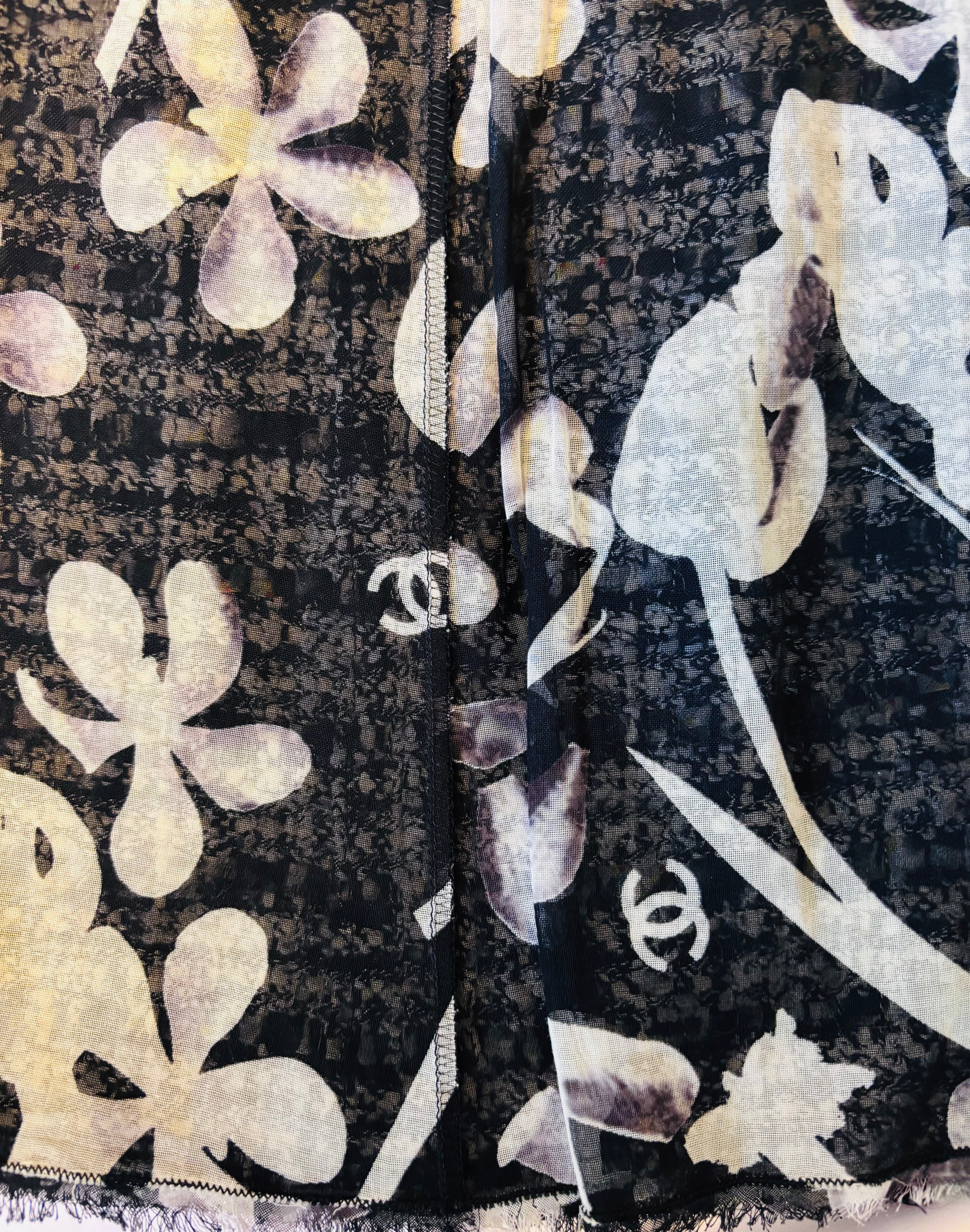 CHANEL Tweed Skirt with Silk Monogram Underskirt: Iconic.
